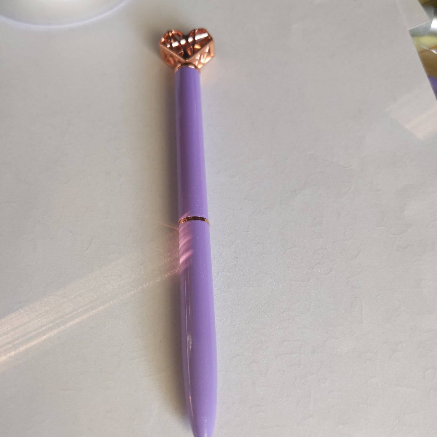 Two Writing Purple Pens