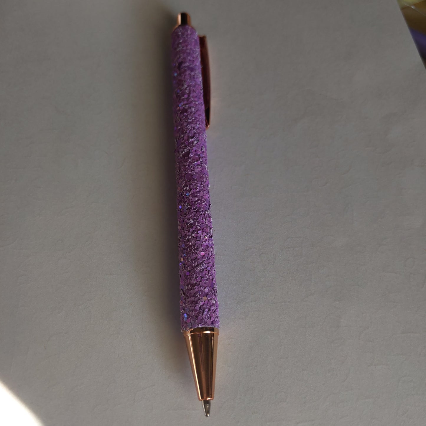 Two Writing Purple Pens