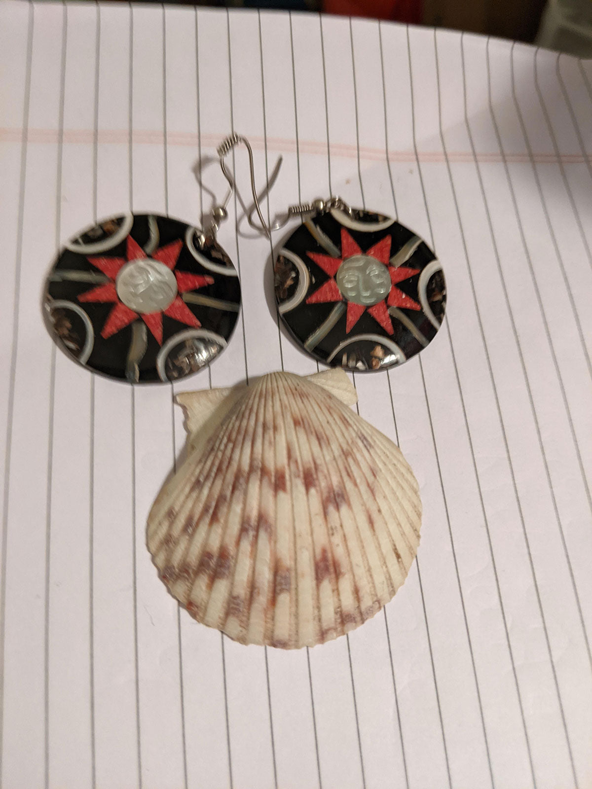 Sun Shell Earrings with a Shell